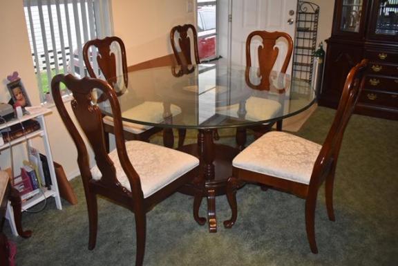 Glass Round Table W/ Cherry Wood Base for sale in New Port Richey FL