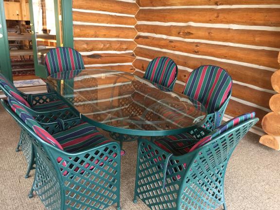 Wrought iron outdoor dining table and 6 chairs for sale in Balsam Lake WI