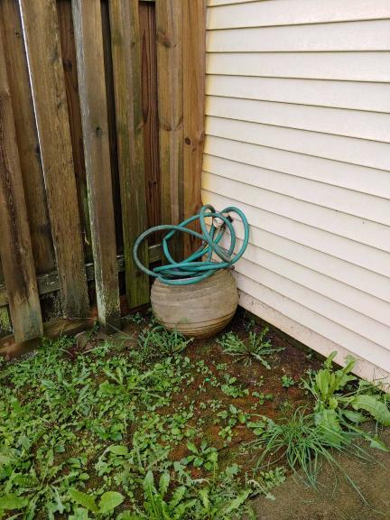 Planter with hose for sale in Fort Knox KY