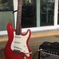 Squier Strat Electric Guitar and Amp for sale in Monticello IN by Garage Sale Showcase member cmsmith7142, posted 10/06/2018