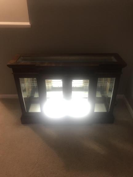 Glass cabinet with light