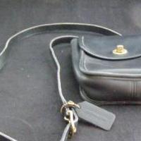 Coach purse in black leather for sale in Antrim County MI by Garage Sale Showcase member 3Musketeers, posted 02/15/2019