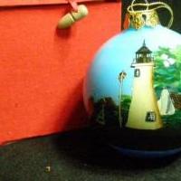 Alessandra Glass inside painted Presque Isle Lighthouse Ornament for sale in Antrim County MI by Garage Sale Showcase member 3Musketeers, posted 02/15/2019
