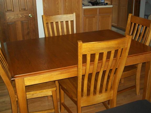 Oak table with 6 chairs and leaf for sale in Deshler OH
