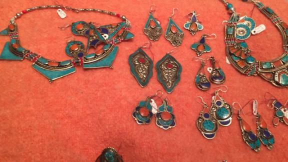 Silver, turquoise, coral and lapis necklaces .