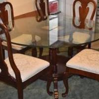 Glass Round Table W/ Cherry Wood Base for sale in New Port Richey FL by Garage Sale Showcase member Diana57, posted 04/07/2019