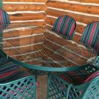 Wrought iron outdoor dining table and 6 chairs for sale in Balsam Lake WI by Garage Sale Showcase member SallyRedding, posted 05/04/2019