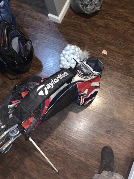 Taylor Made bag with irons, drivers and balls for sale in Noblesville IN