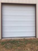 10 x 10 Rolling Garage doors like new for sale in Concan TX