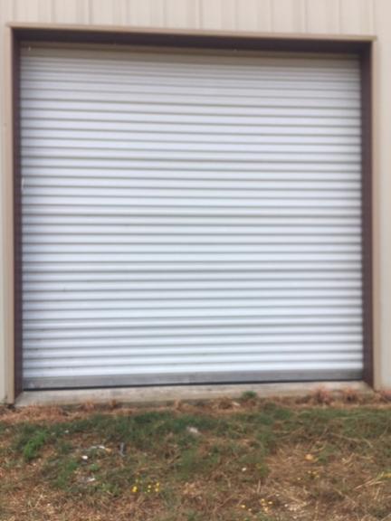 10 x 10 Rolling Garage doors like new for sale in Concan TX