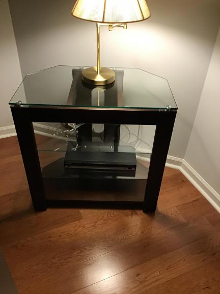 Glass top table with shelves for sale in Pinehurst NC