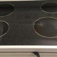 GE electric stove, 4 burners, white for sale in Jupiter FL by Garage Sale Showcase member ch0084, posted 02/02/2020