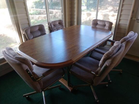 Patio Dining Table with Center Leaf with 6 Roller Chairs
