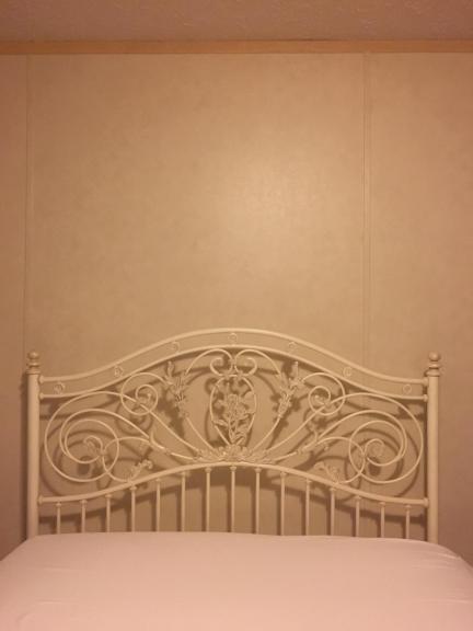 Antique off white full size bed head and foot board for sale in Lafayette NJ