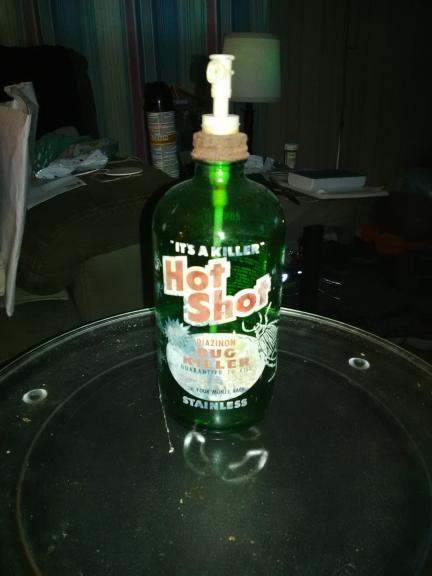 Old glass insecticide spray bottle for sale in Atlantic Beach NC