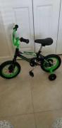 Childs bicycle with training wheels for sale in Fort Pierce FL
