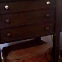 Antique sewing machine cabinet for sale in Mill Creek IN by Garage Sale Showcase member loismarie, posted 04/04/2021
