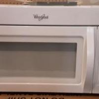 Microwave Whirlpool  has 2 speed fan/light/clock. mounts above stove. for sale in Mchenry IL by Garage Sale Showcase member Freebird, posted 03/10/2021