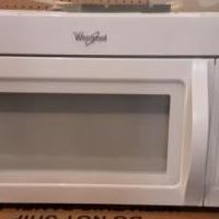 Microwave Whirlpool has 2 speed fan/light/clock. mounts above stove. for sale in Mchenry IL by Garage Sale Showcase member Freebird, posted 03/10/2021