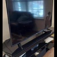 52" Flat T.V. with stand for sale in Princeton TX by Garage Sale Showcase member erezgi, posted 02/27/2021