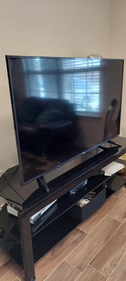 52" Flat T.V. with stand for sale in Princeton TX