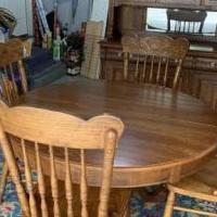 Keller Solid Oak Dinning Set China Cabinet and Table w/2 Leaves and 4 Chairs for sale in Holland MI by Garage Sale Showcase member Richard VANDYK, posted 07/21/2021