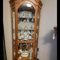Corner curio cabinet for sale in Breese IL by Garage Sale Showcase member FloGolf36, posted 11/11/2021