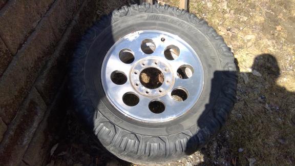 Four(4) Ford F250 Custom Rims and tires