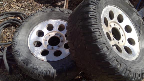 Four(4) Ford F250 Custom Rims and tires