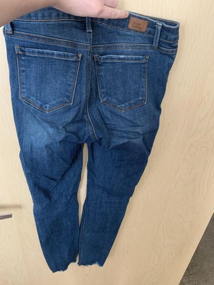 Dark blue ripped jeans
