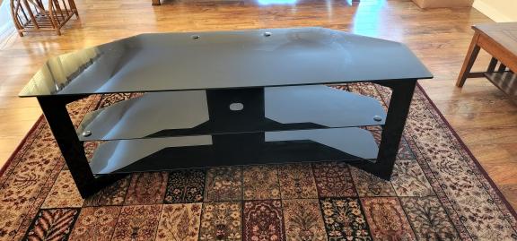 Glass TV stand. for sale in Naples FL