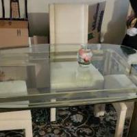 Glass dining room table and chairs for sale in Willimantic CT by Garage Sale Showcase member Finalstage1, posted 07/10/2022