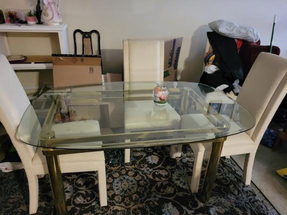 Glass dining room table and chairs for sale in Willimantic CT