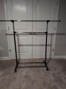 Clothes rack, on rollers, adjust 3 ways, sturdy for sale in Toledo OH
