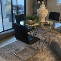 Modern Glass Dining Table for sale in Bradenton FL by Garage Sale Showcase member KristineSzark, posted 04/28/2022