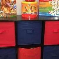 2 tier shelf with 6 bins and early learning stuff for sale in Katy TX by Garage Sale Showcase member nina1103, posted 10/27/2023