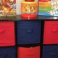 2 tier shelf with 6 bins and early learning stuff for sale in Katy TX by Garage Sale Showcase member nina1103, posted 10/27/2023