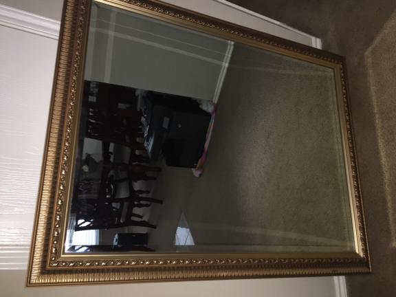 2 Gold tone Framed Mirrors