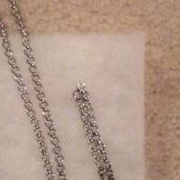 Silver Chanel Necklace with the signature double C's for sale in Roseville MI by Garage Sale Showcase member Elle514, posted 04/09/2018