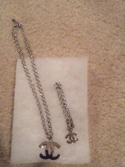 Silver Chanel Necklace with the signature double C's for sale in Roseville MI