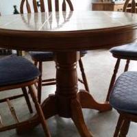 42" Round tile top pedistal table + 4 chairs for sale in Pinehurst NC by Garage Sale Showcase member susan1, posted 05/28/2018